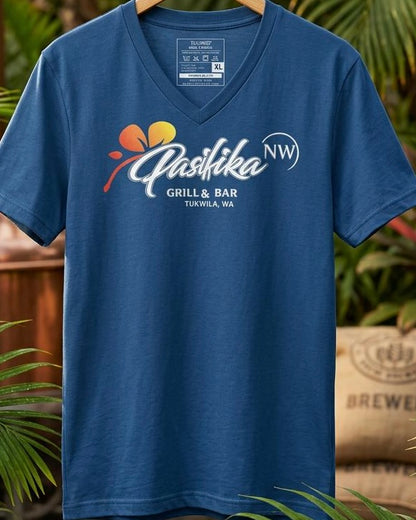 Pasifika NW Grill & Bar blue v-neck t-shirt on hanger - tropical background
